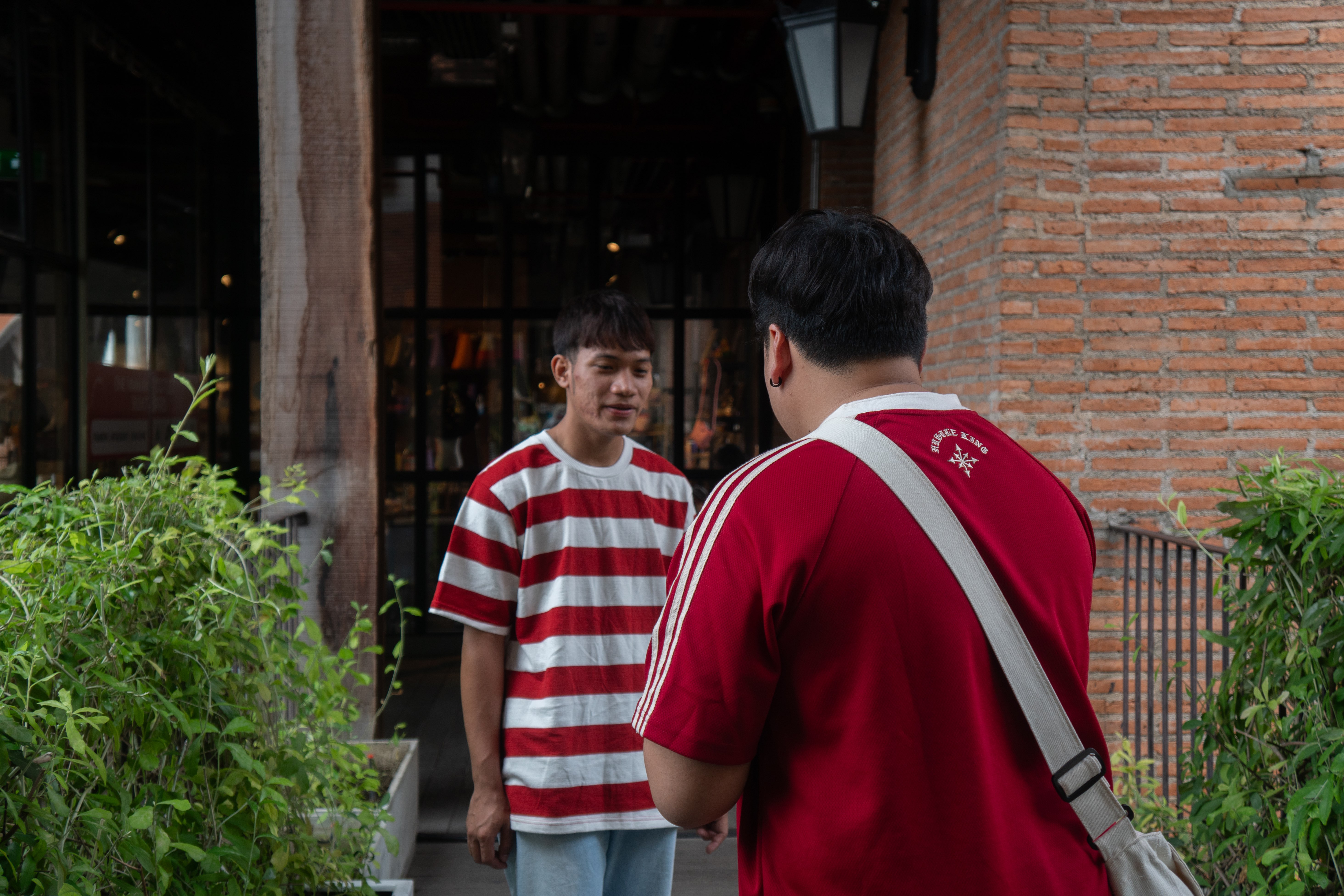 Two guys in red in Thailand