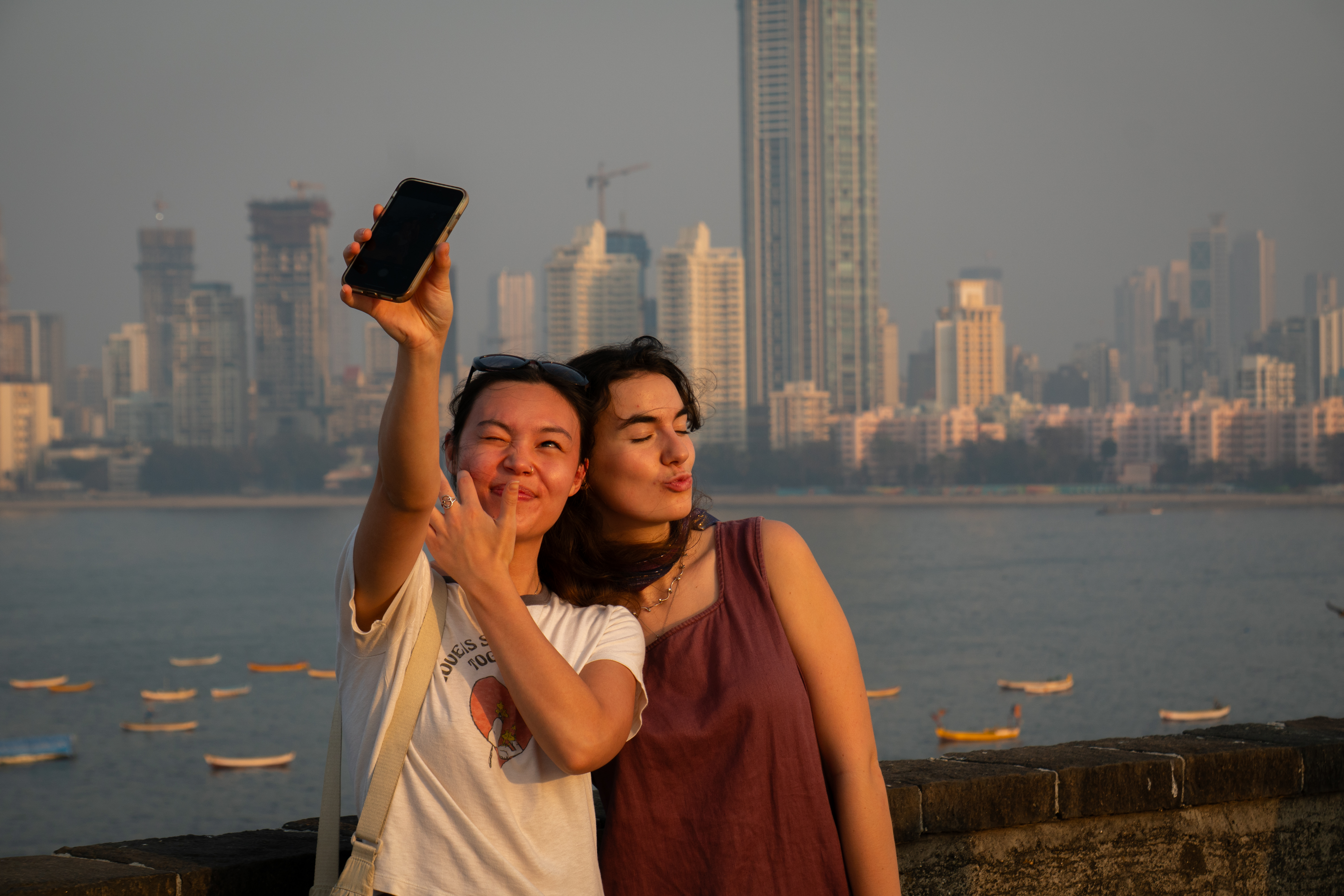 Abby and Sasha taking selfies in Mumbai